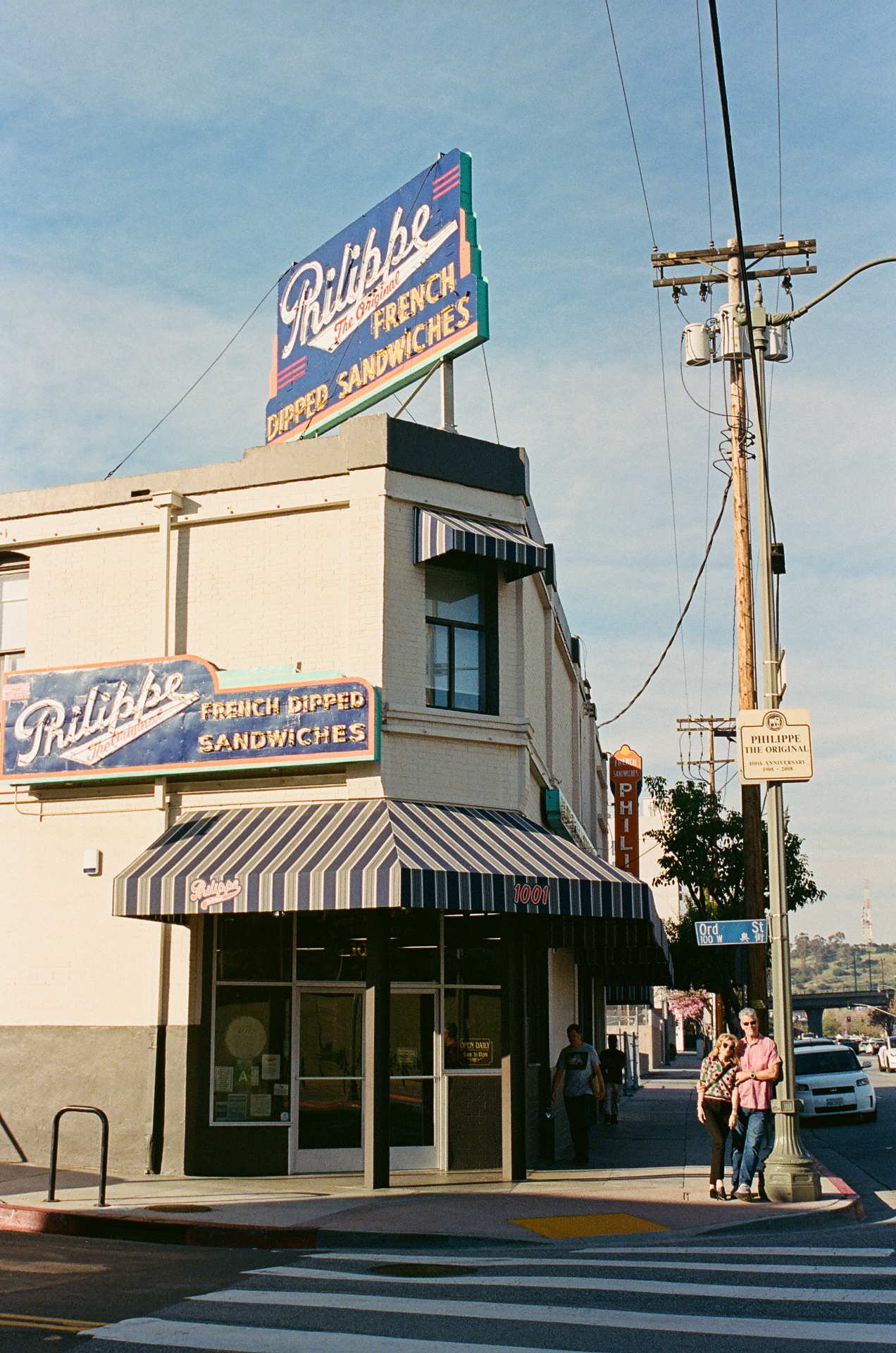 Philippe's French Dipped Sandwiches storefront at dusk