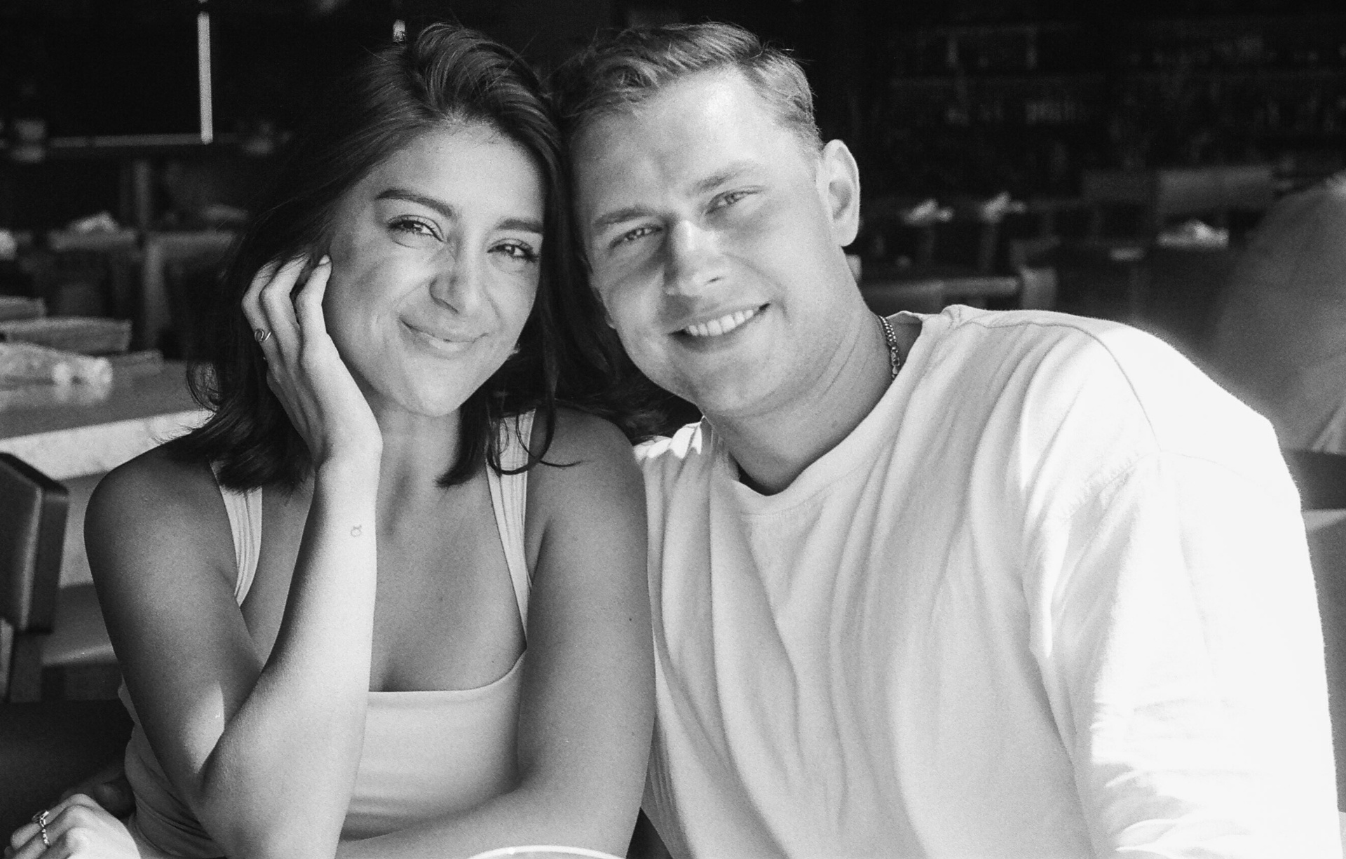 Black and white portrait of a couple at the table